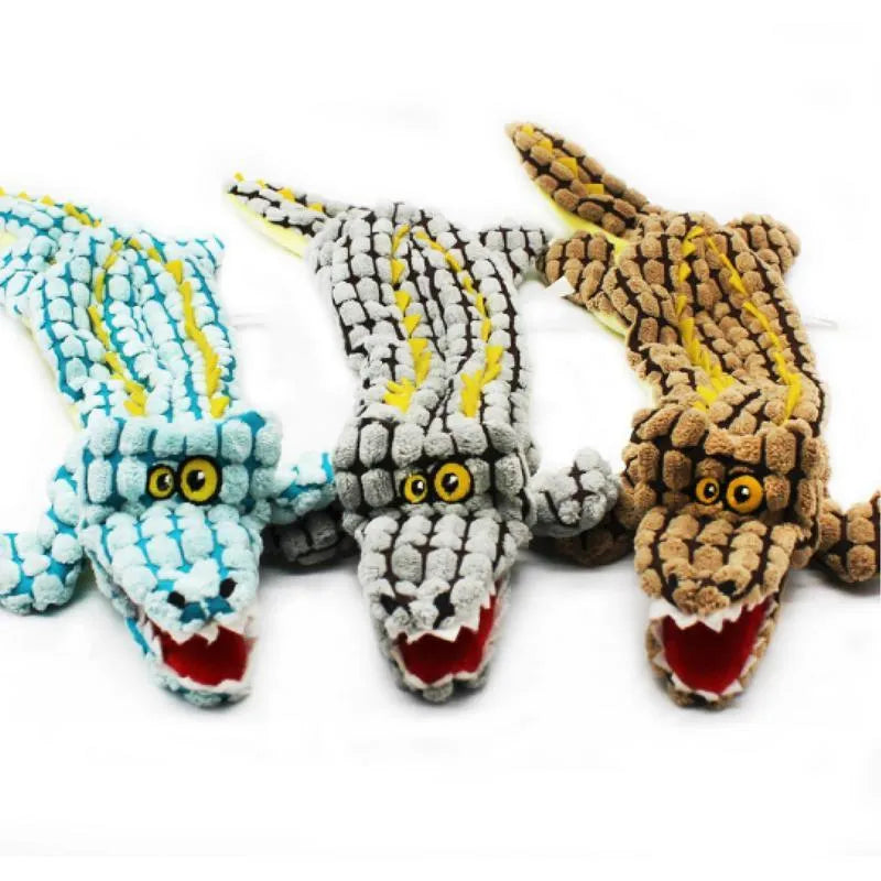 Blue crocodile-shaped plush dog toy with corduroy texture and squeaker for small and large dogs