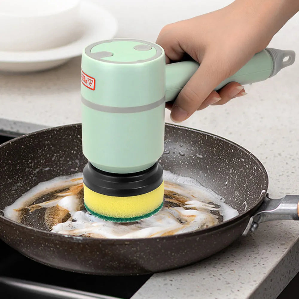 Electric cleaning brush with three interchangeable heads for kitchen and bathroom use