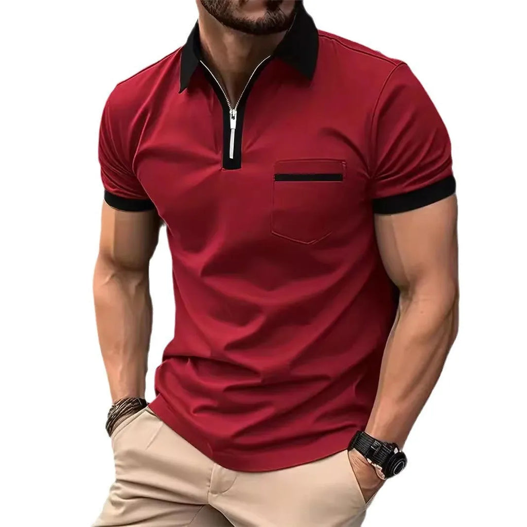 Man wearing a loose fit casual short sleeve shirt with a chest pocket and zipper decoration.
