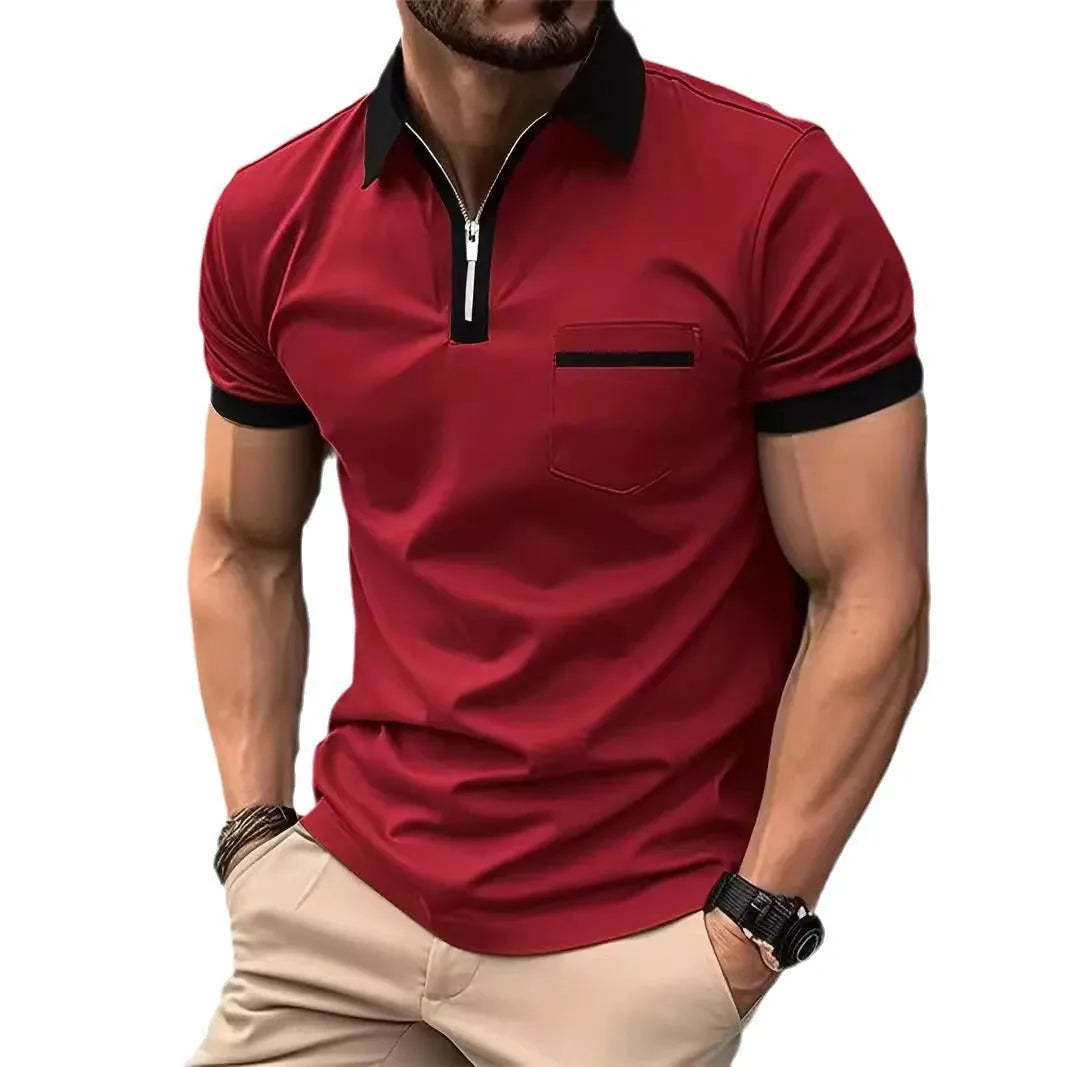 Man wearing a loose fit casual short sleeve shirt with a chest pocket and zipper decoration.