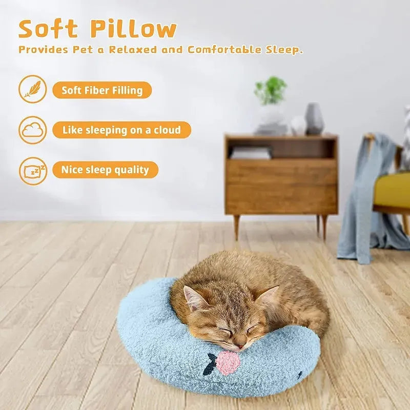 Small U-shaped plush pet pillow in blue for cats and small dogs on a white background.