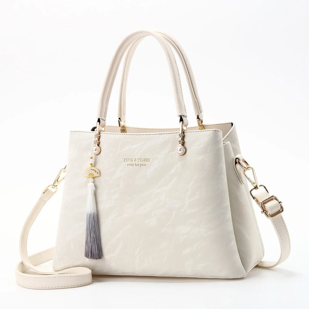 Women's PU shoulder bag in horizontal square shape with slit pocket, available in beige, black, green or red ethnic colours