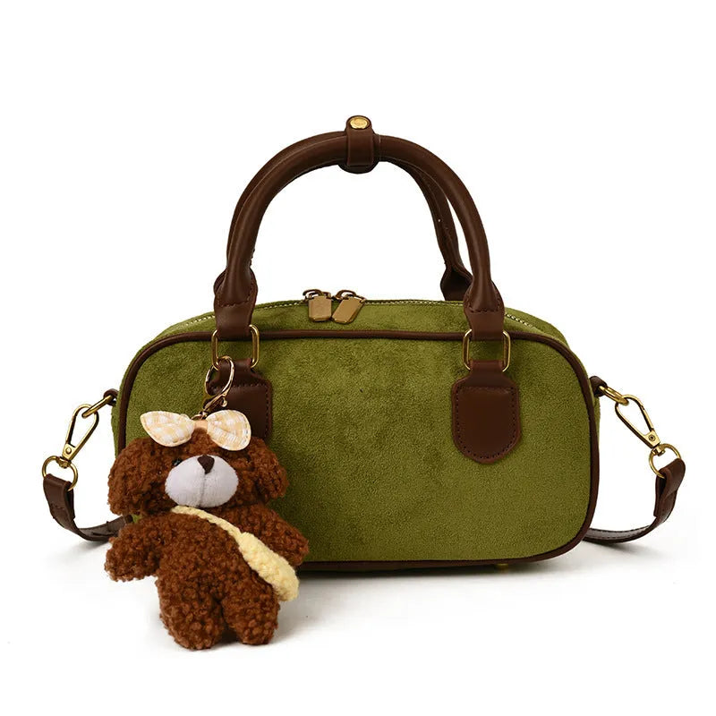 PU bowling bag in black, brown, coffee or green with optional pendant, horizontal square shape and single strap.