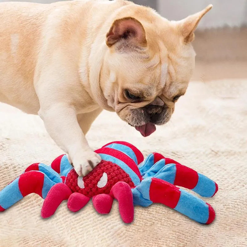 Red teddy bear dog toy for medium and large breed puppies on a neutral background.