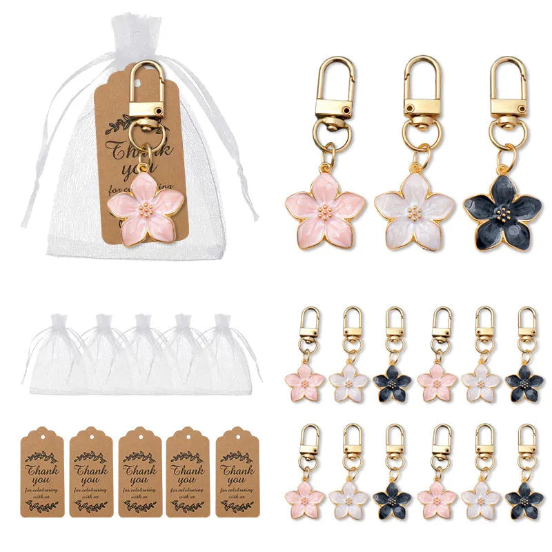 Colourful alloy cherry blossom bag pendant with pearlescent oil finish, 4cm flower shape