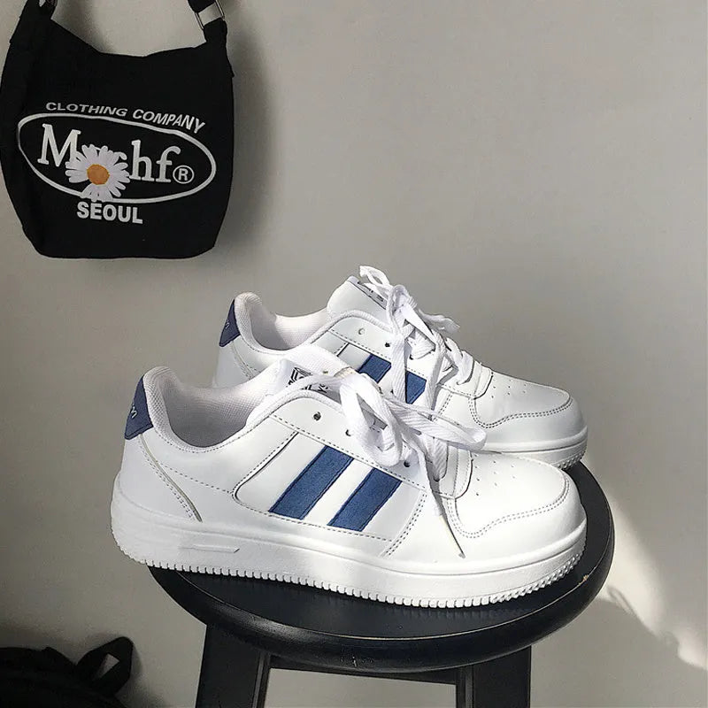 Low cut small white PU sports casual shoe for man, solid colour, adhesive construction