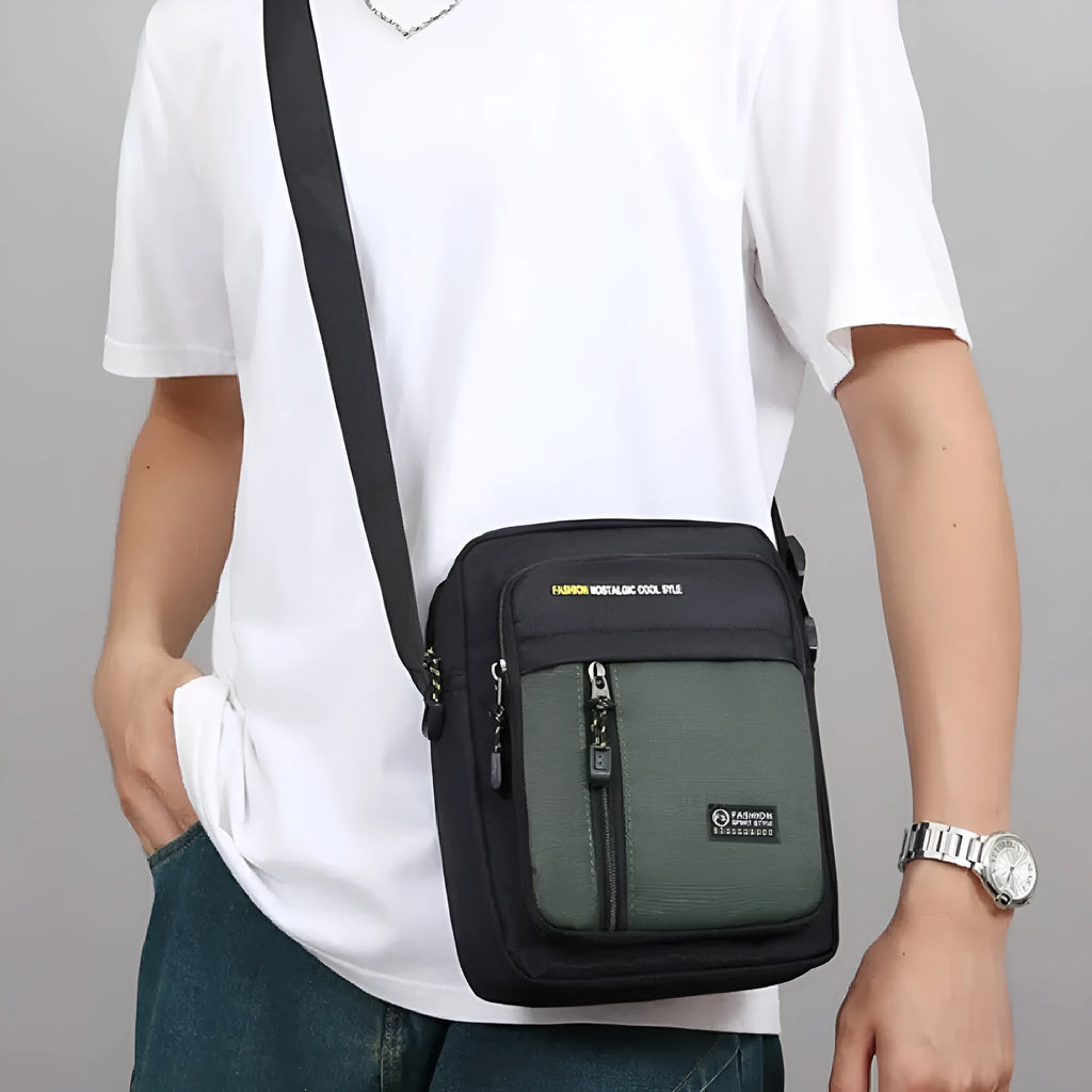 Men's casual nylon one shoulder messenger bag in green, gray, black, or blue colour with sewing thread details.