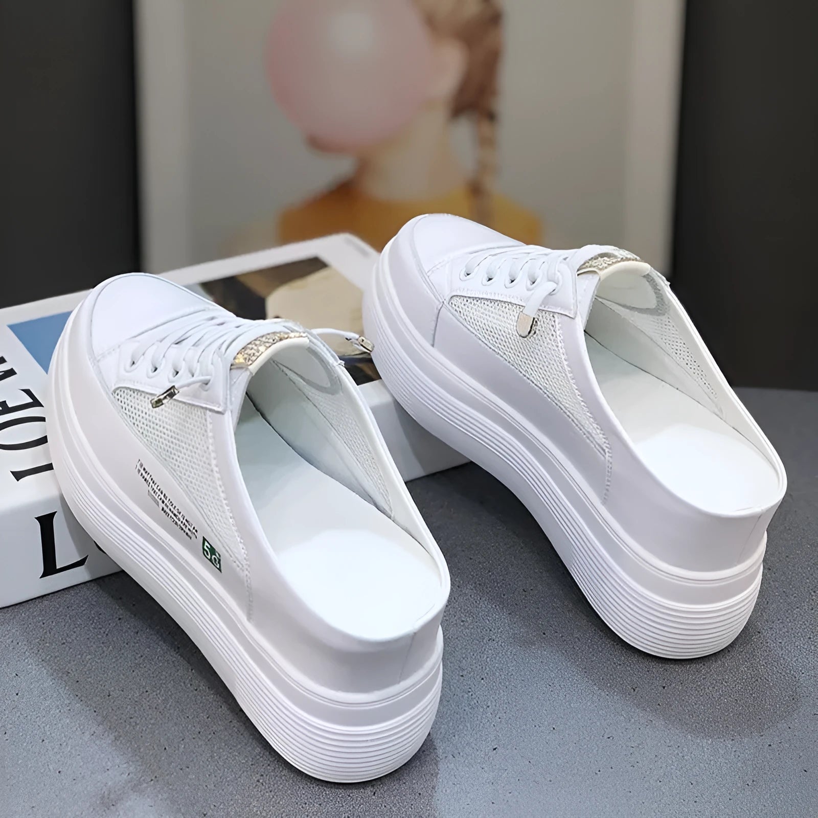 White women's platform shoes with mesh surface and heel-free design