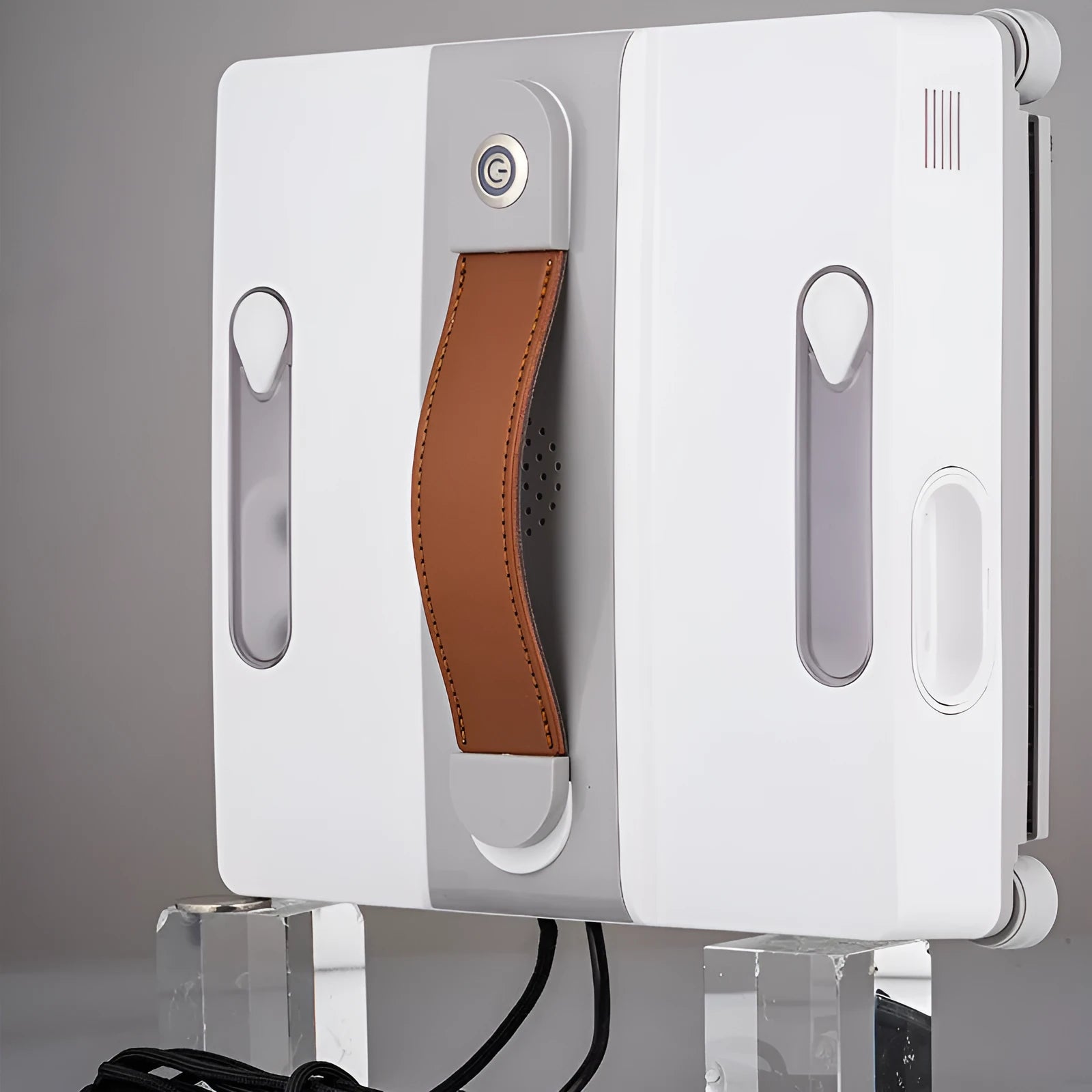 White intelligent window cleaning robot with a square 220mm body on a glass window pane.