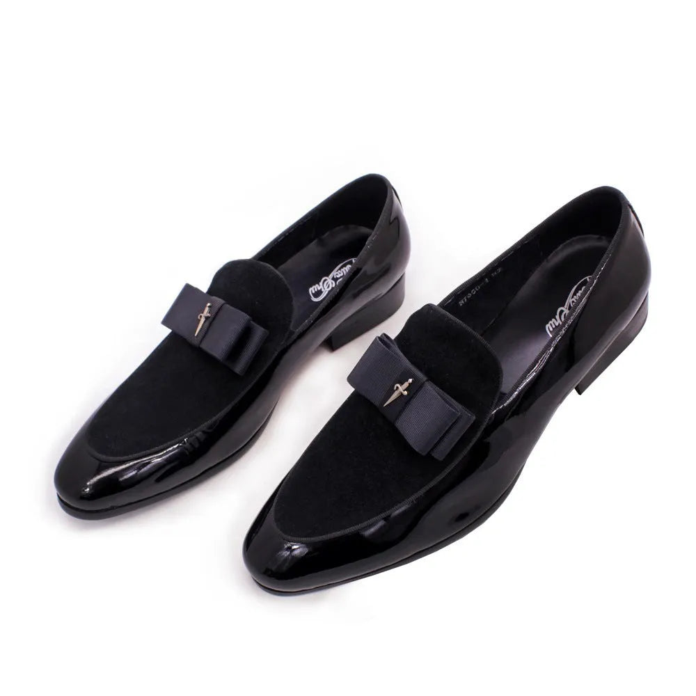 Men's glossy black patent leather low-top shoes with a tassel detail on a white background