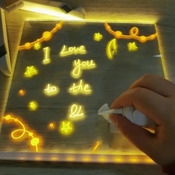 Large LED note board with colour illumination in Artboard style on a desk