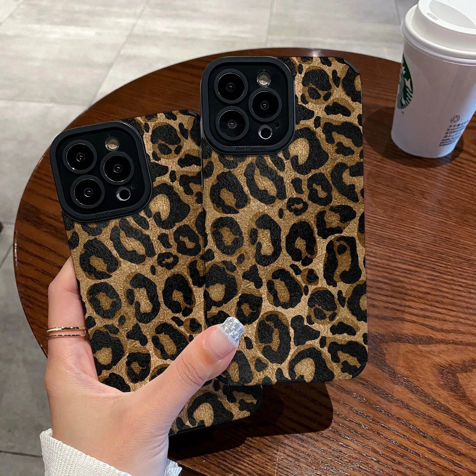 Gold leopard print all-inclusive imitation leather phone case for iPhone on a white background