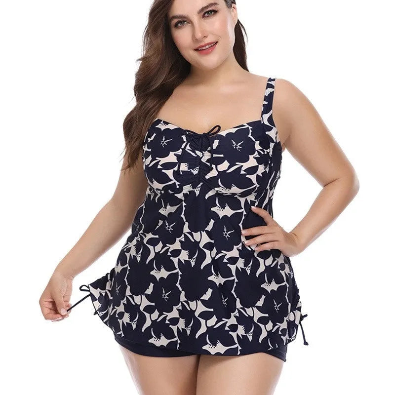 Plus size two-piece swimwear set in polyester with hedging detail, available in Leaf, Green, Blue, and Red, sizes XL to 6XL.