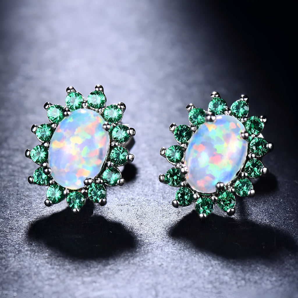 Oval diamond stud earrings in copper with electroplated platinum-tone finish, geometric shape, one pair
