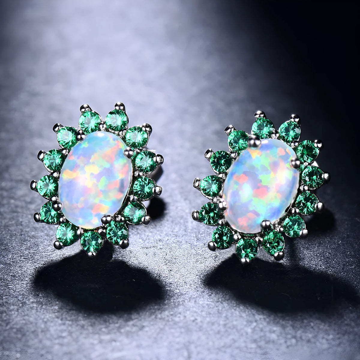 Oval diamond stud earrings in copper with electroplated platinum-tone finish, geometric shape, one pair