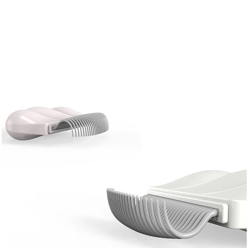 Paw Soft deshedding brush for pets in blue, pink, or white, measuring 9cm by 9cm.