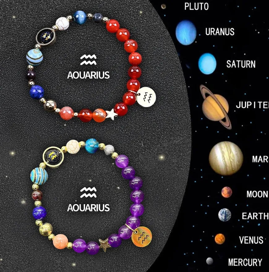 Set of two natural stone zodiac bracelets with 8mm gemstone beads on black elastic cord.