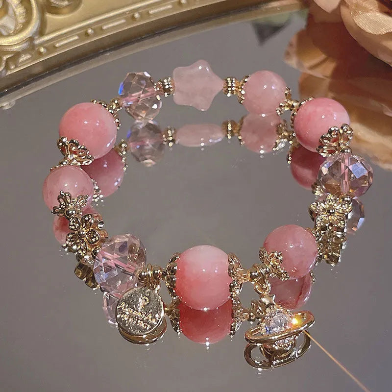 Women's galaxy-coloured alloy bracelet with bow and snowflake pendant charm