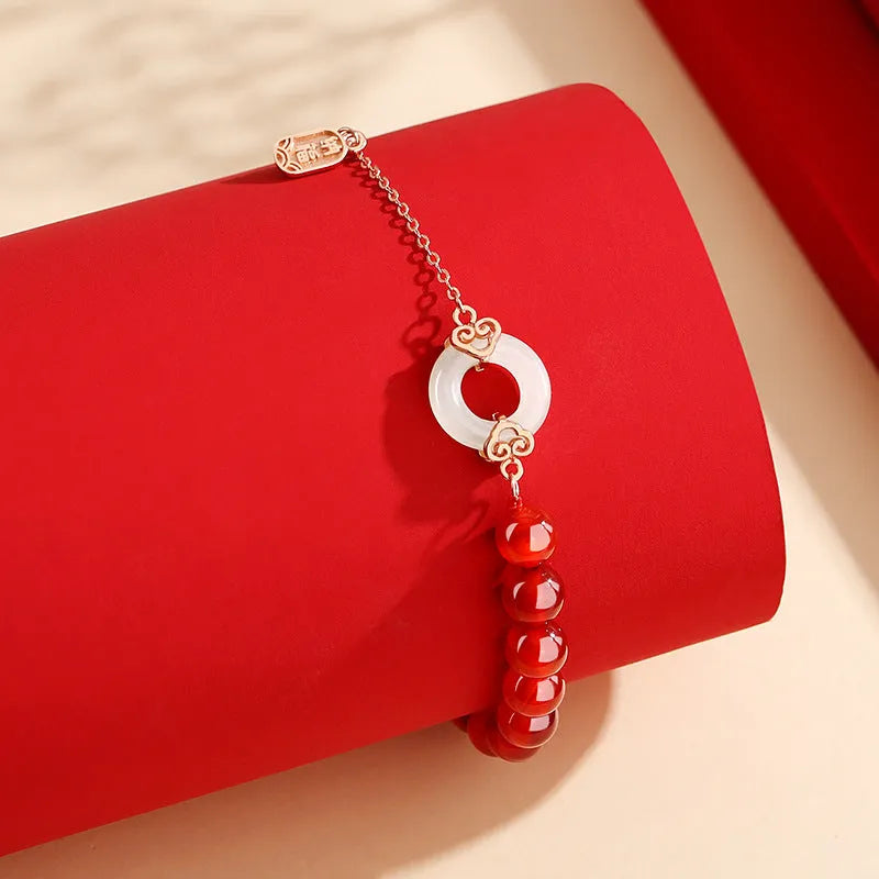 Women's sterling silver 925 bracelet with peace buckle charm and traditional Xiangyun design