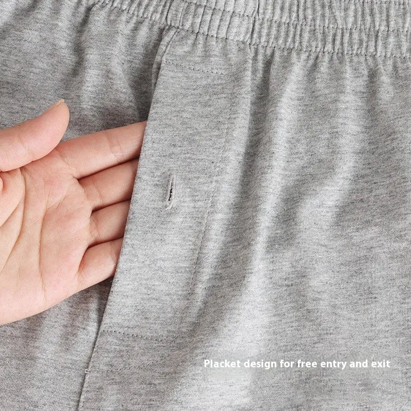 Men's loose fit high waist boxer shorts in pure cotton, shown in light grey, dark blue, and black colours.