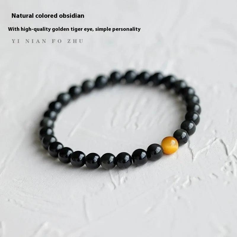 Black obsidian stone bracelet with geometric beads in Korean unisex style.