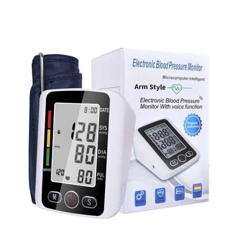 Automatic arm blood pressure monitor on a table with large screen and arm cuff.