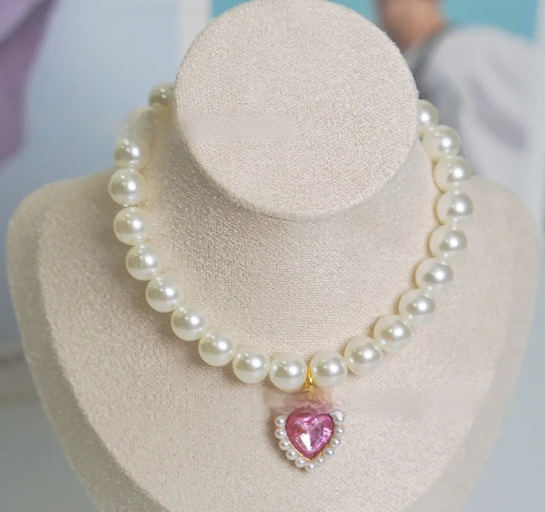 Decorative cat collar with plastic alloy resin construction and central gemstone charm in multiple colour options