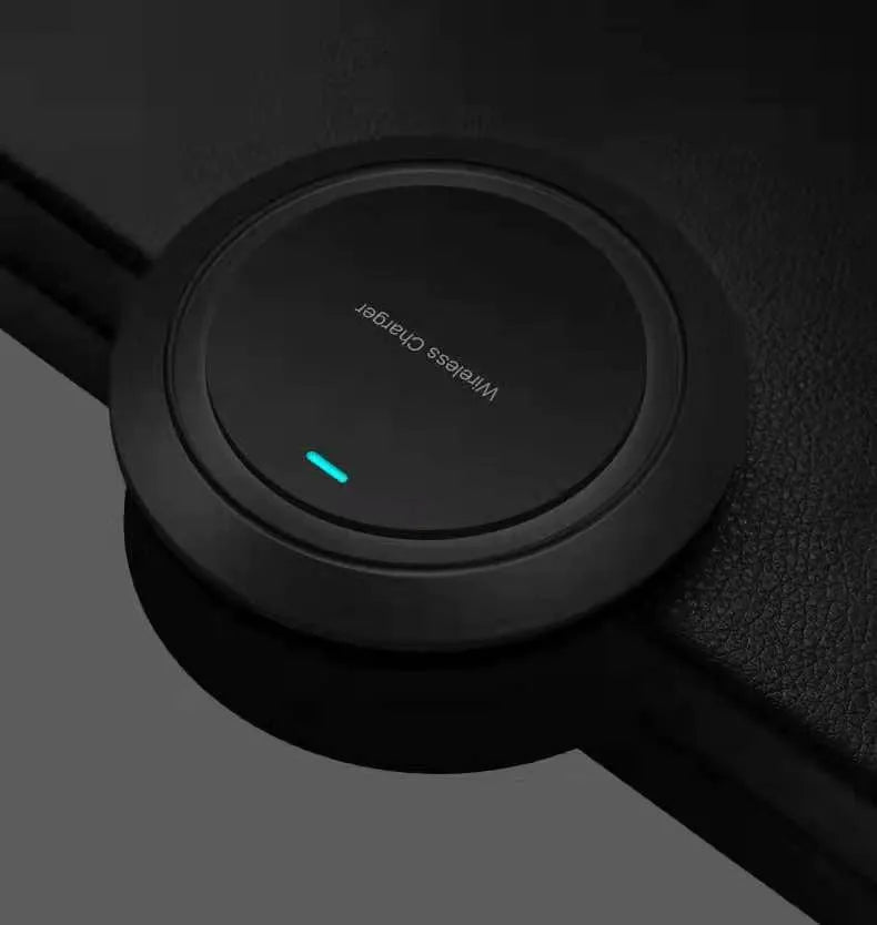 Round white desktop wireless phone charger with 10W fast charging capability
