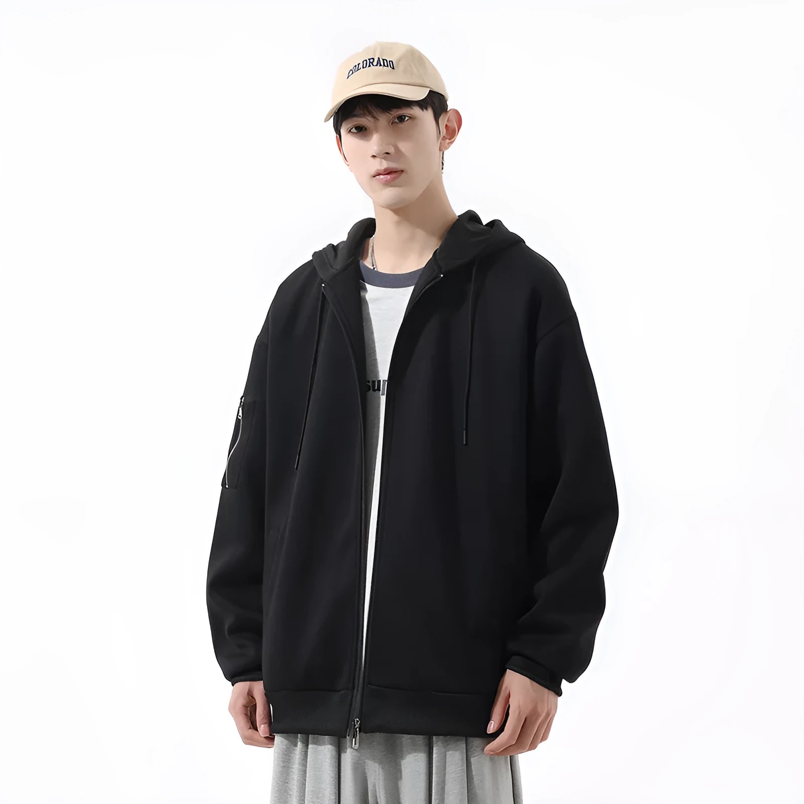 Loose hooded cardigan for teenagers in solid black, unlined polyester fibre, relaxed fit, front view