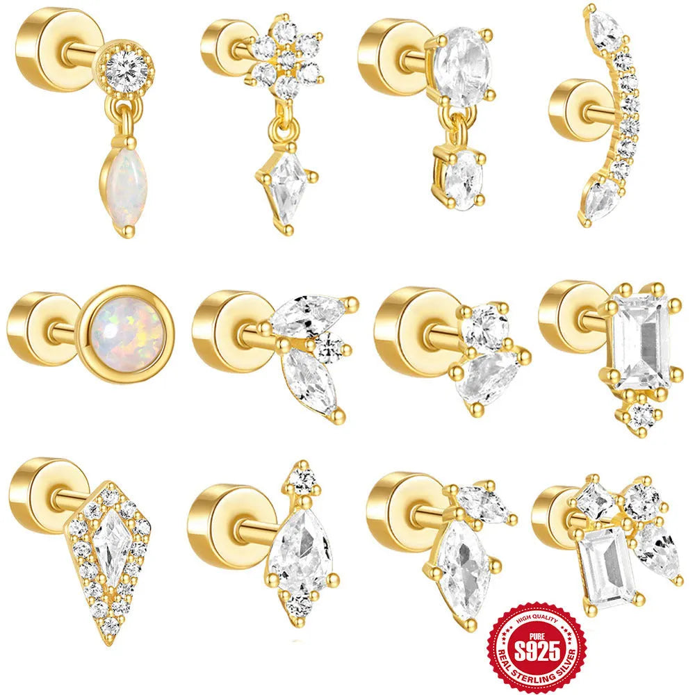 A pair of minimalist S925 sterling silver ear bone studs with a flat column thread post in a gold tone colour.