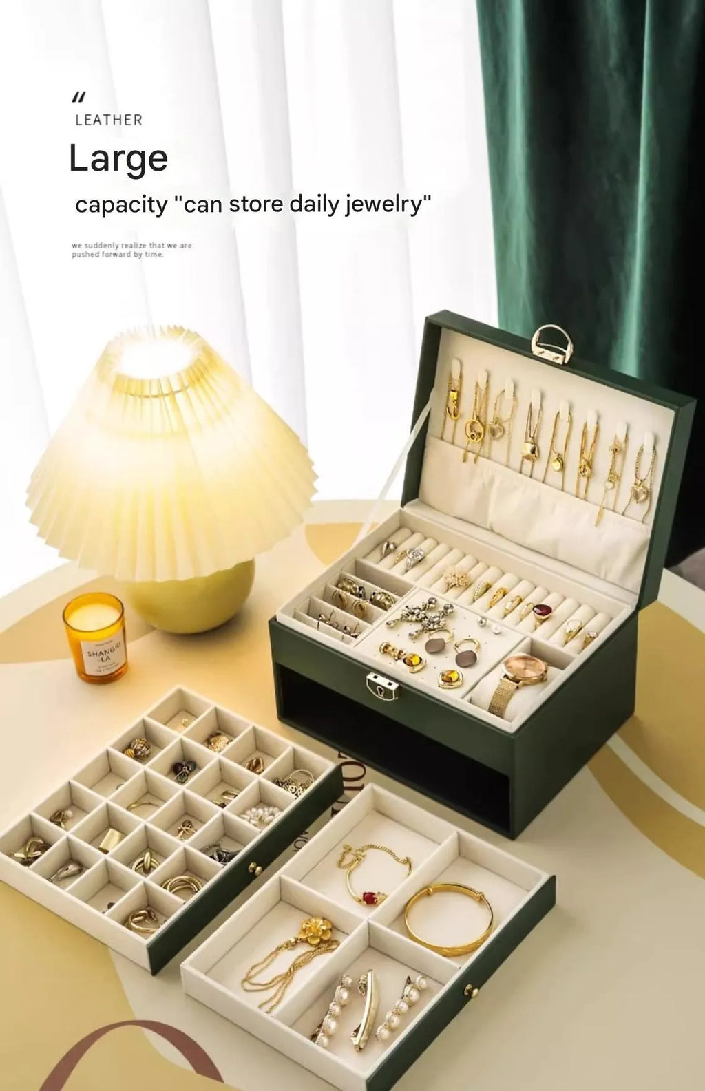 Leather jewellery storage box with three drawers open showing removable dividers and satin lining in four colour options