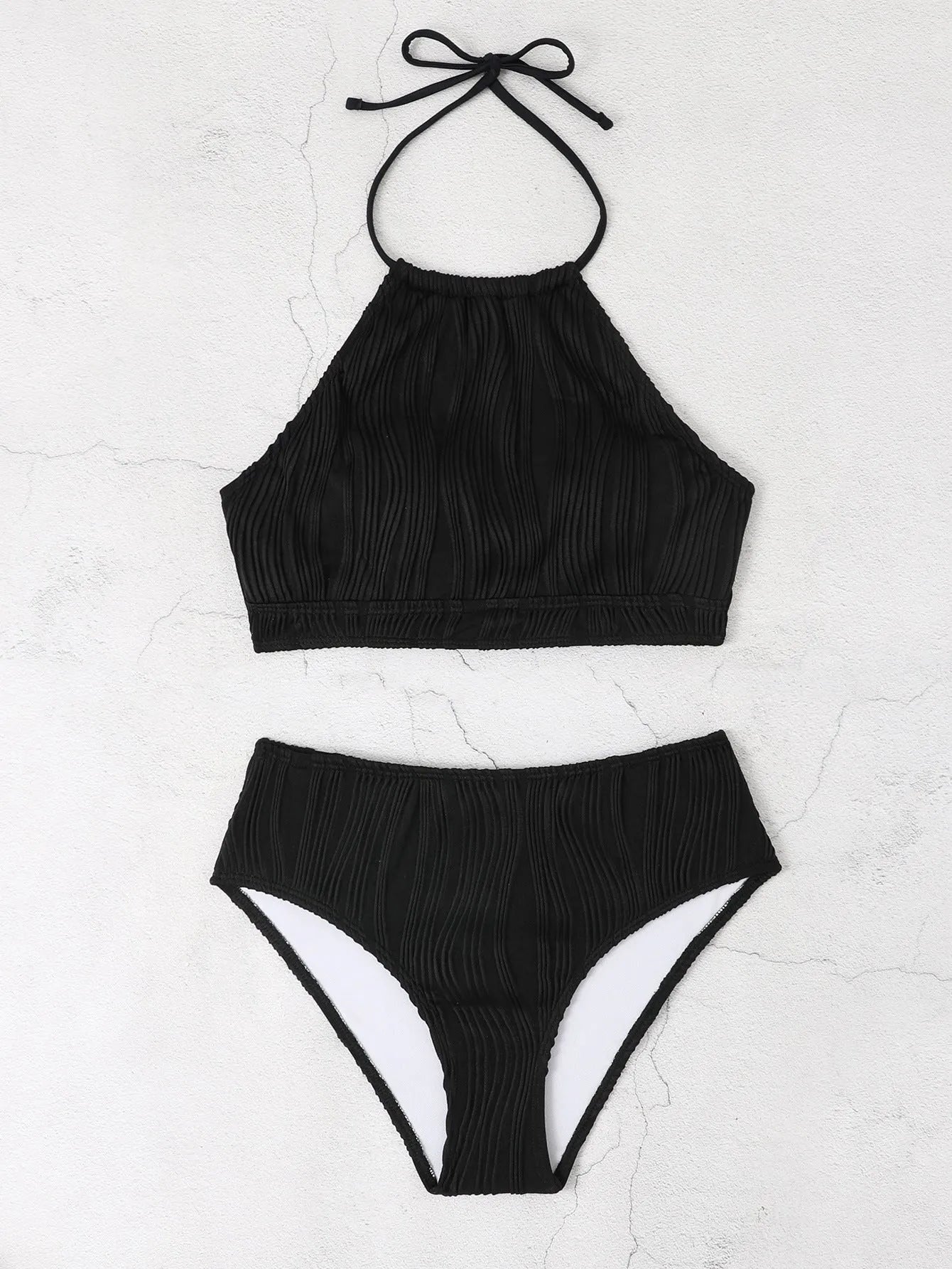 Women's conservative high-waist swimwear set in apricot colour with separate top and pants