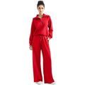 Red polyester women's casual sportswear set with zip-up hoodie and wide-leg pants
