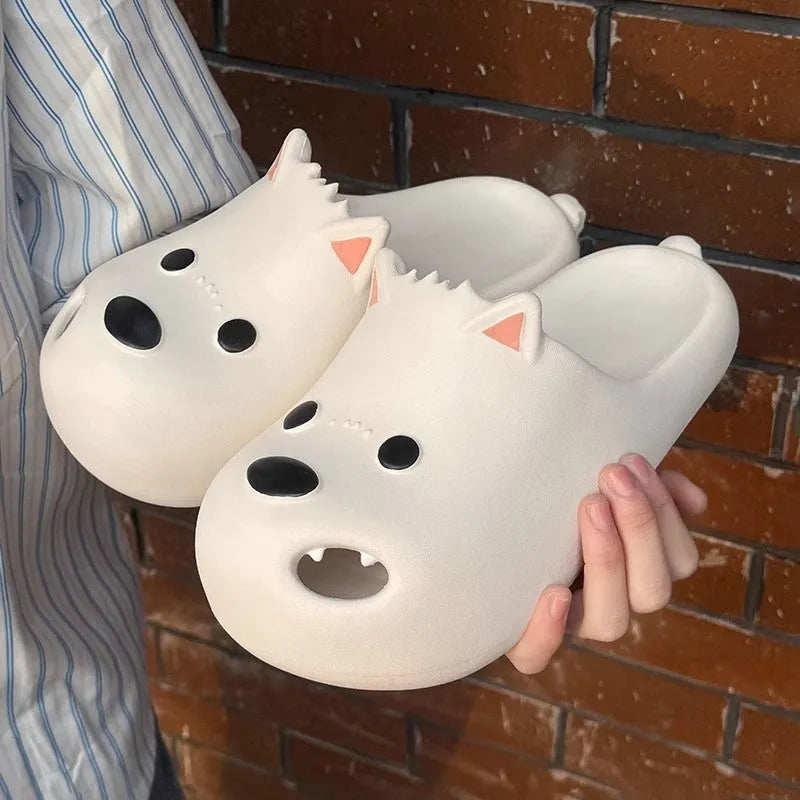 White and black women's EVA puppy slippers with toe cap sandal design showing injection moulded soles