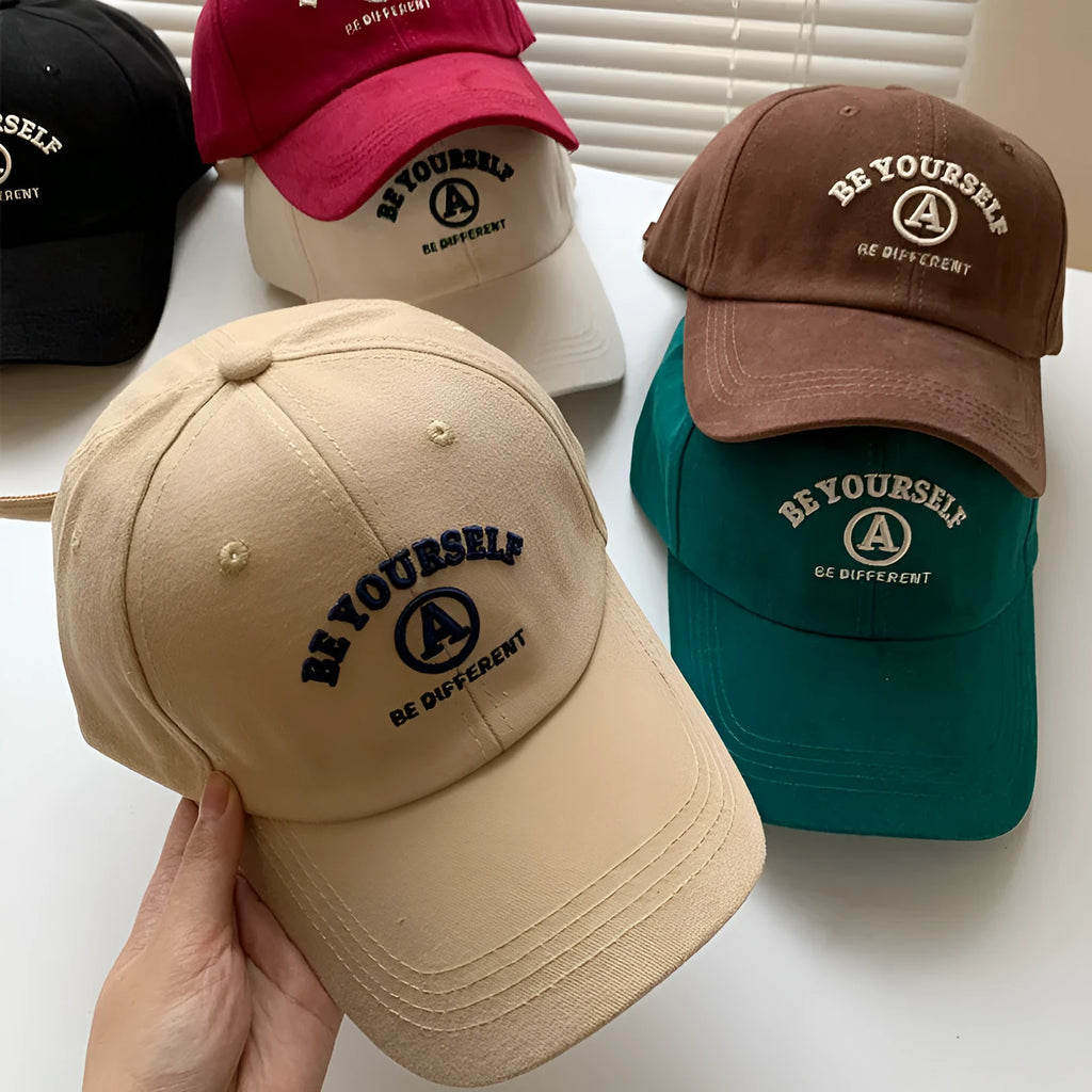 Cotton baseball cap with embroidered couple face, adjustable head circumference, available in six colours