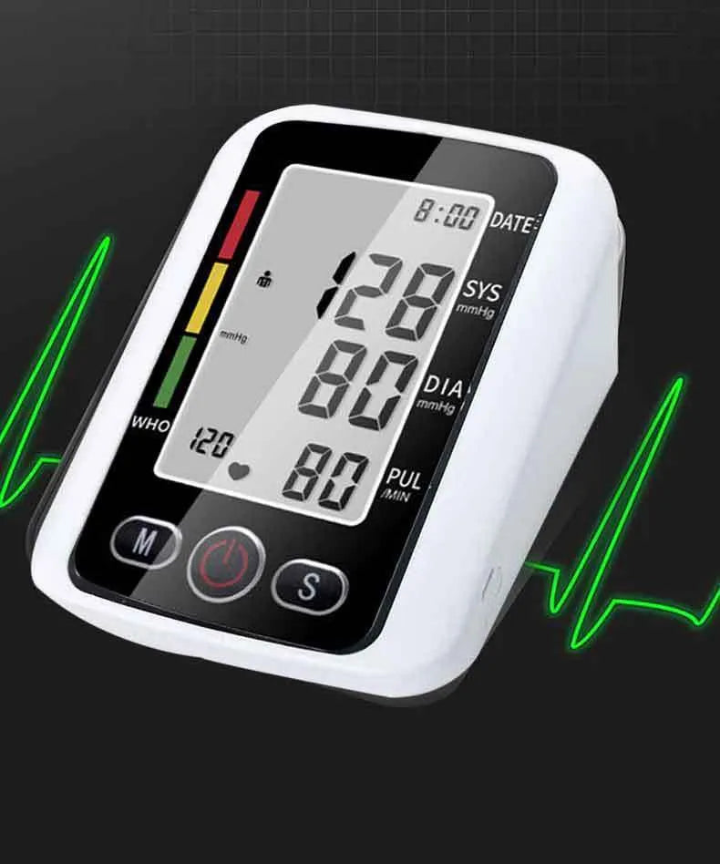 Automatic arm blood pressure monitor on a table with large screen and arm cuff.