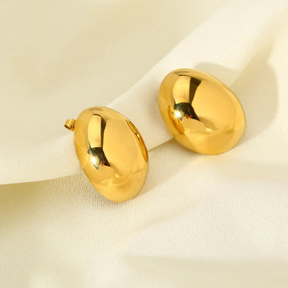 Geometric stainless steel ear studs with a glazed electroplated finish in colour DFE139.