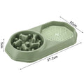 Blue slow feeder dog bowl with maze pattern for interactive feeding, showing non-slip pads on base.