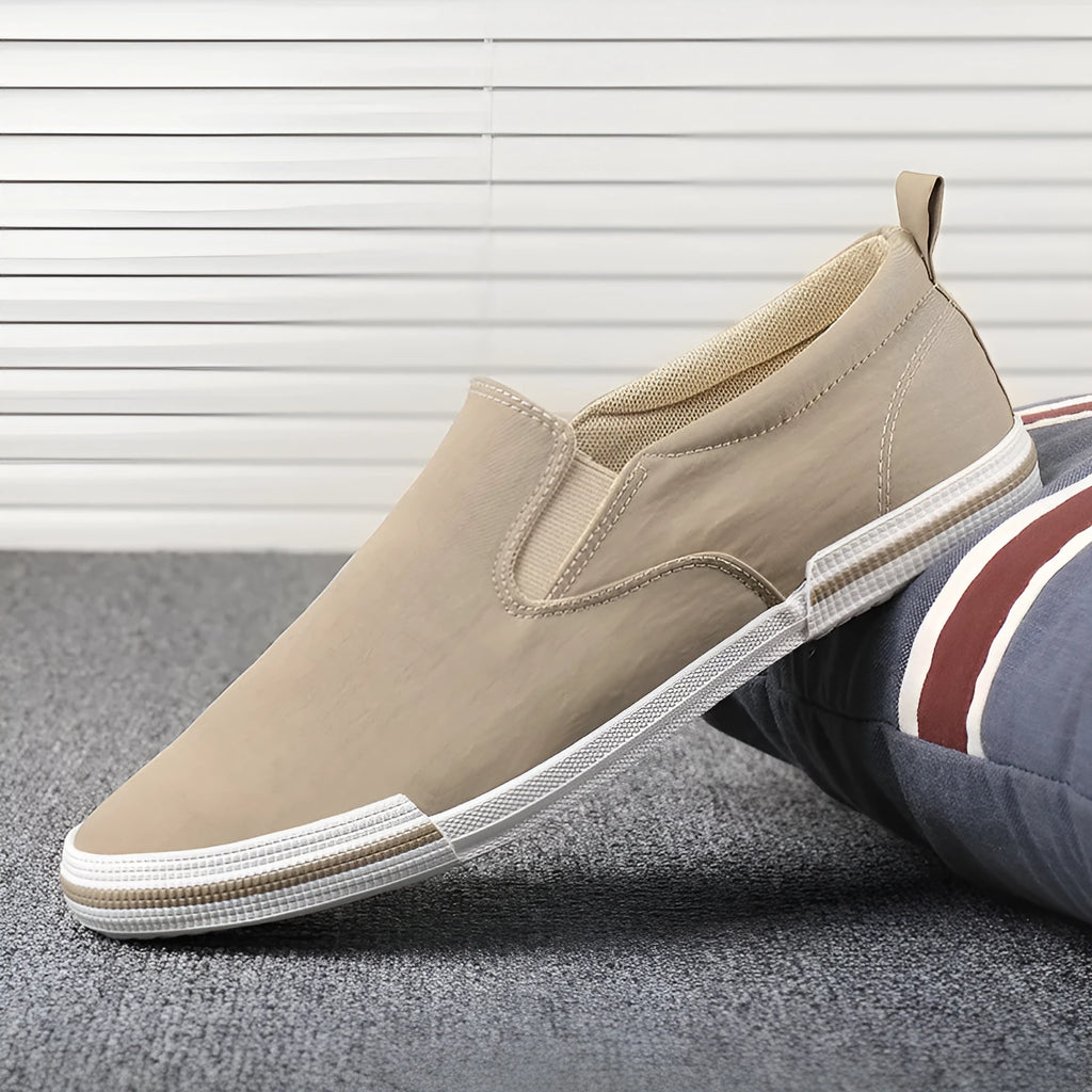 Men's casual canvas sneakers in grey, black orange, and khaki with vulcanised rubber soles