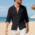 Man wearing a loose-fit light blue linen casual shirt with a non-iron finish.