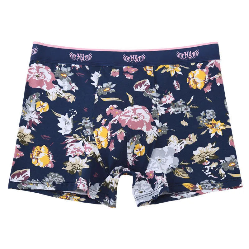 Men's cotton boxer shorts with mid-waist design and U-shaped construction in floral pattern