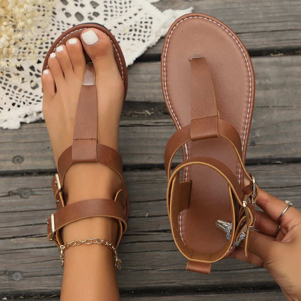 Korean style low heel flip toe Roman sandals with belt buckle detail in black