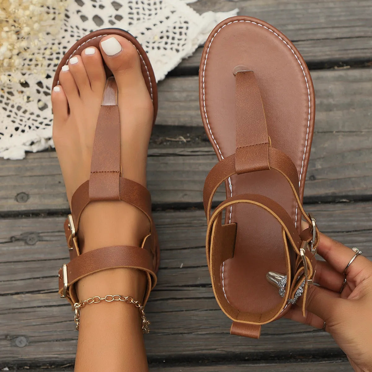 Korean style low heel flip toe Roman sandals with belt buckle detail in black