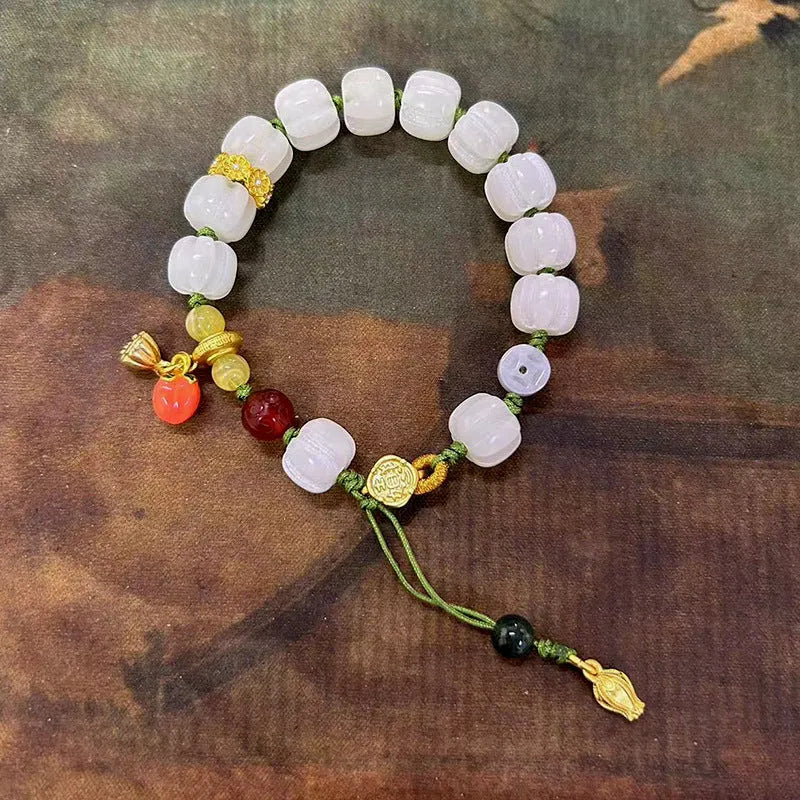White jade Bodhi bracelet with lotus and pumpkin beads on open rope with ring clasp