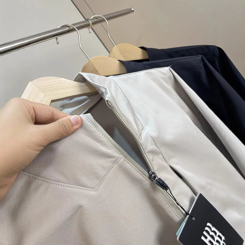Man wearing a stand collar straight hem casual sports jacket in polyester fabric.