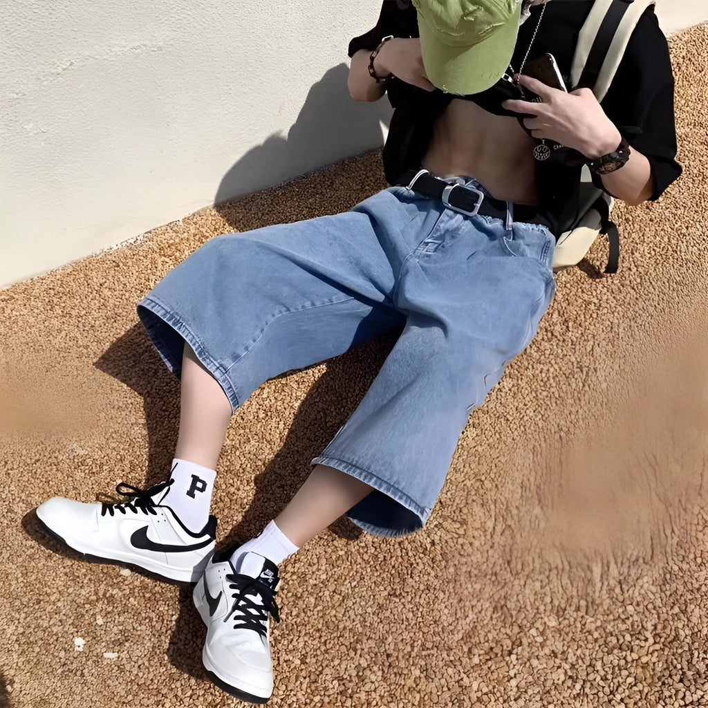 Blue men's thin denim pirate shorts with a high waist and cropped straight-leg fit.