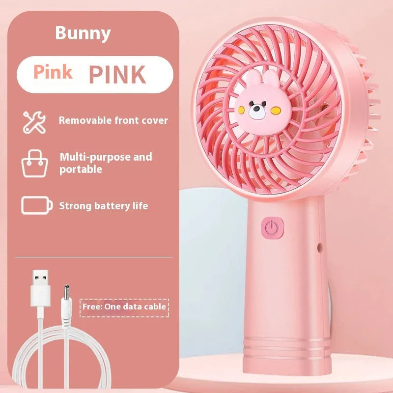 Outdoor portable USB rechargeable handheld fan in pink with plastic blades and brushed motor