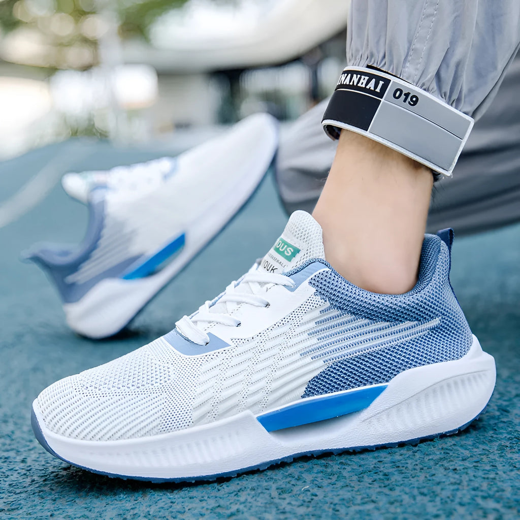 Men's blue casual sports shoes with mesh upper and plastic sole, shown with grey and green colour options.