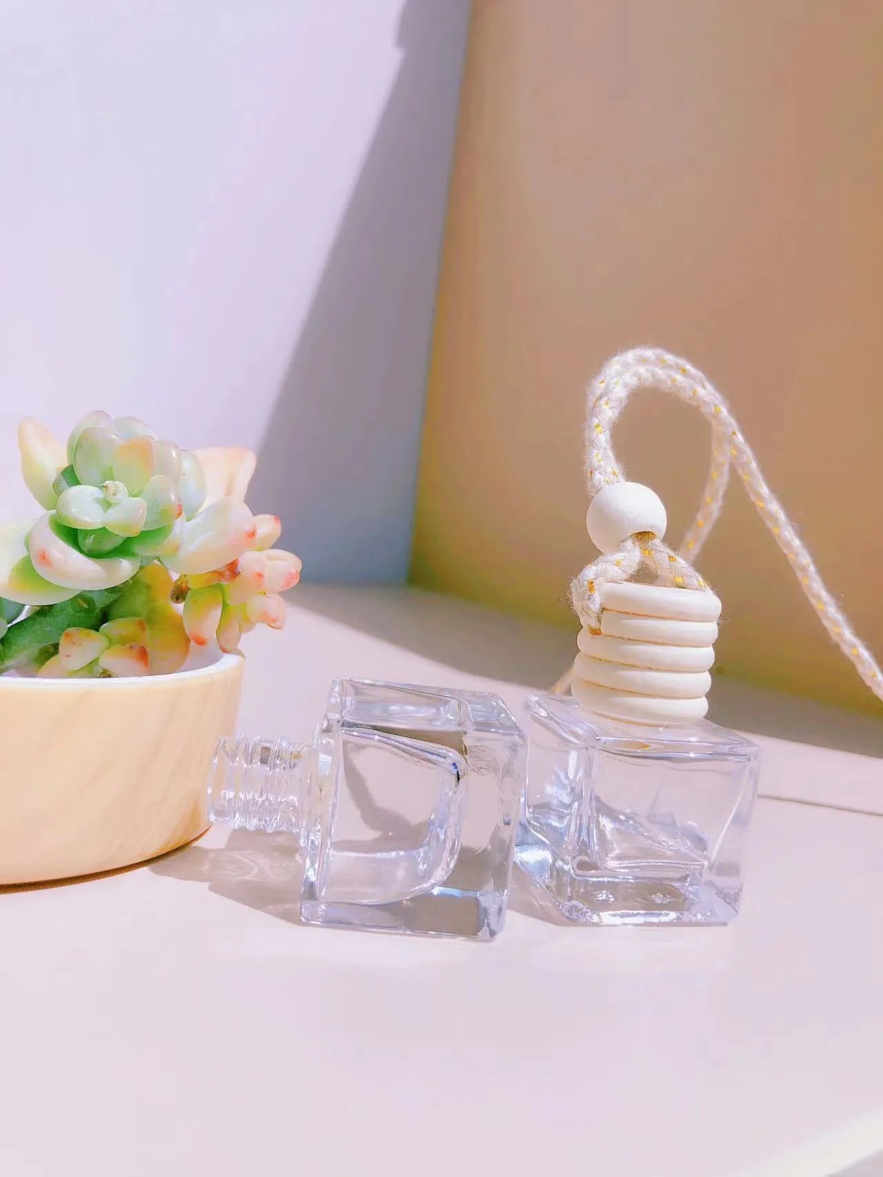 Glass car perfume pendant fragrance bottle in cylinder, diamond, flat drum, and square shapes