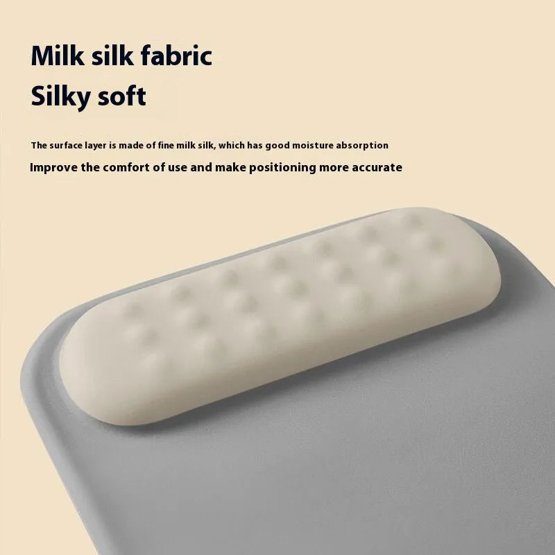Ergonomic cloth silicone mouse pad for wrist support in a contrast colour style.
